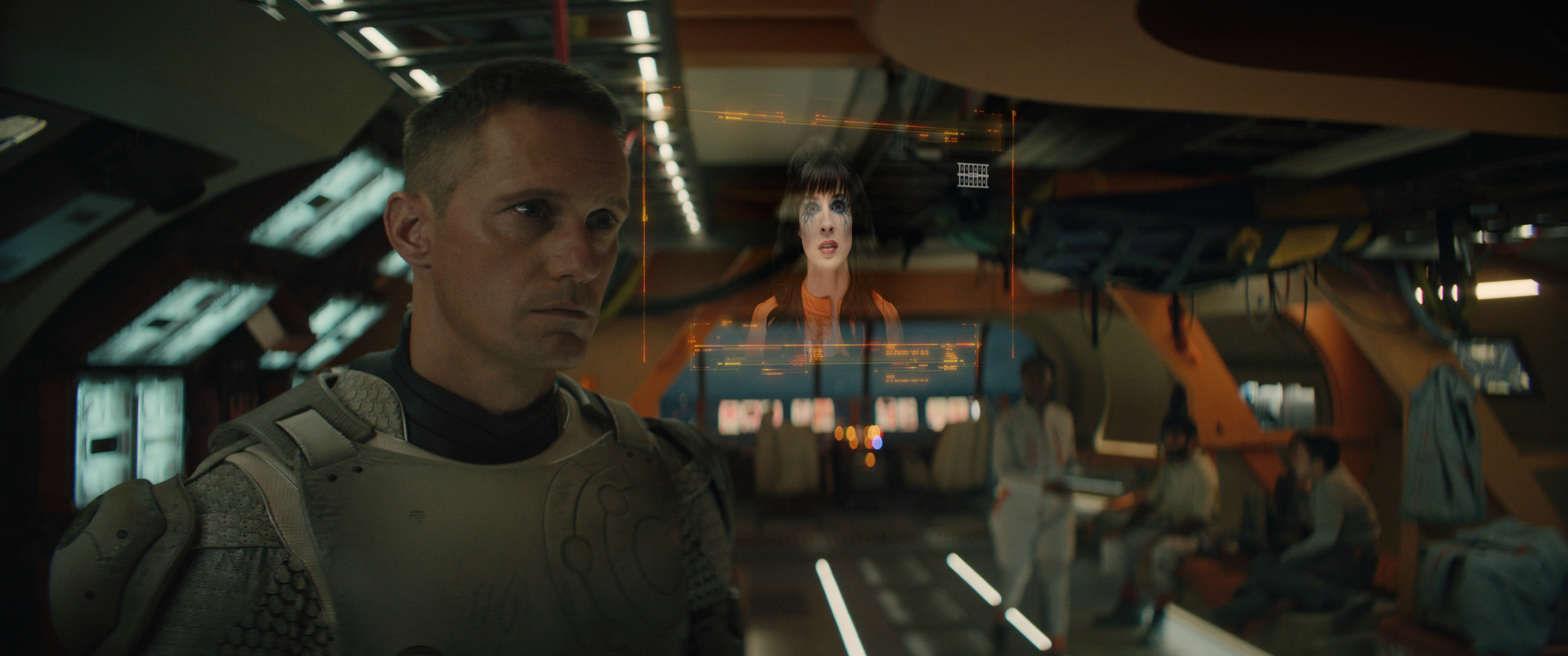 Murderbot binge-watching shows on a screen